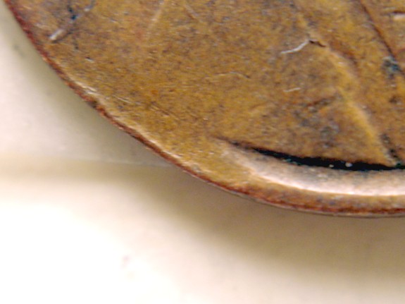 1945-Lincoln-Wheat-Cent,-Struck-Thru-Or-Post-Mint-Damage?